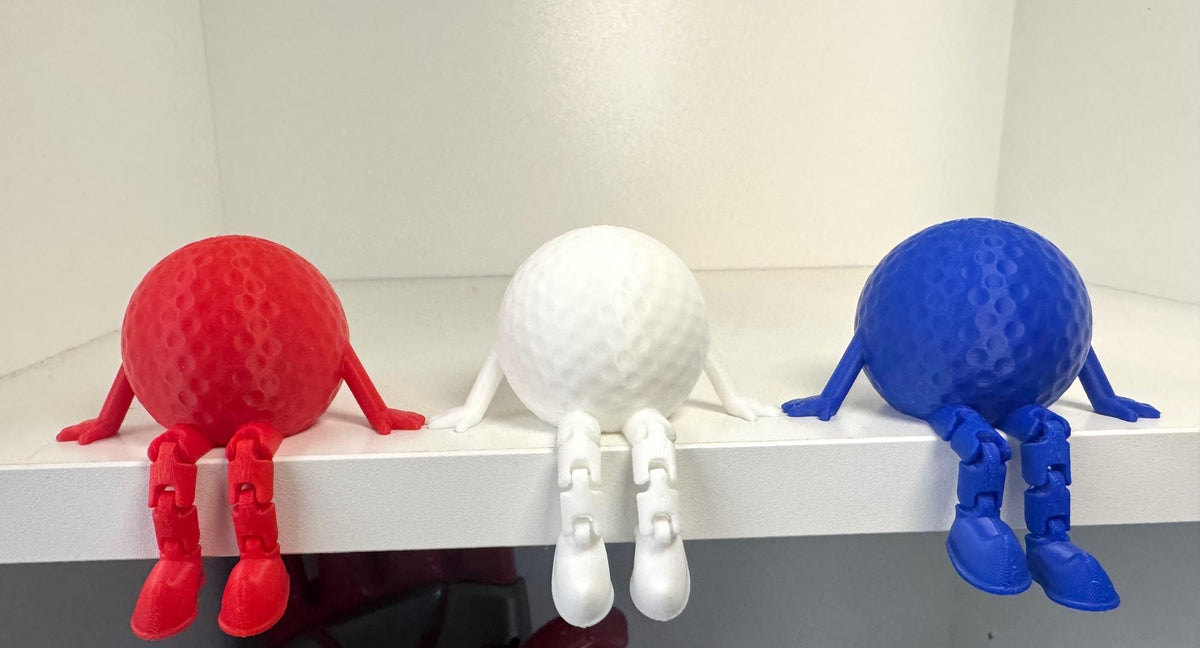 3D Printed Golf Ball Desk Toy: Flexible Leg Shelf Decor